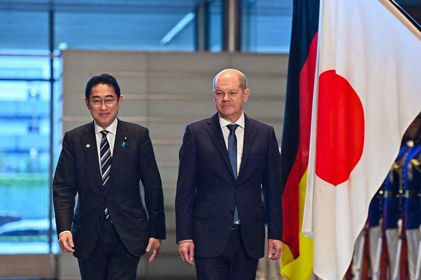 TOKYO – Japan and Germany vowed to deepen cooperation on defence and climate protection, and work more closely together to reduce excessive dependen