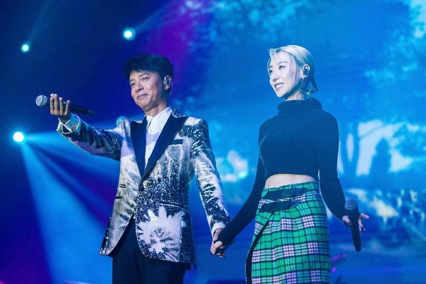 Concert review: Cantopop superstar Hacken Lee charms with cool charisma,  stage experience | The Straits Times