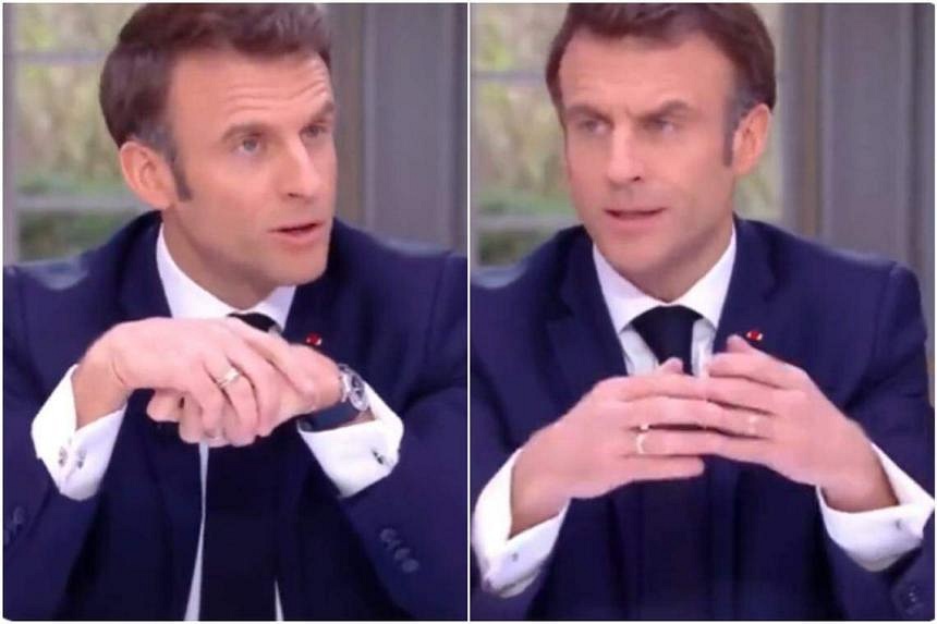 France s Macron removes pricey watch during TV interview on