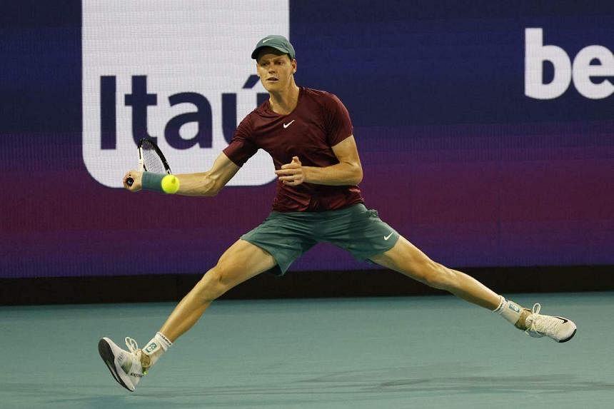 Jannik Sinner of Italy plays a forehand in his quarter final match