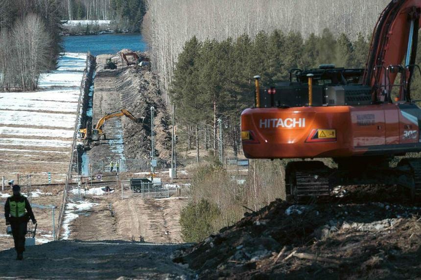 Finland Unveils First Section Of Russian Border Fence The Straits Times   FINLAND RUSSIA UKRAINE CONFLICT BORDER SECURITY 103103 