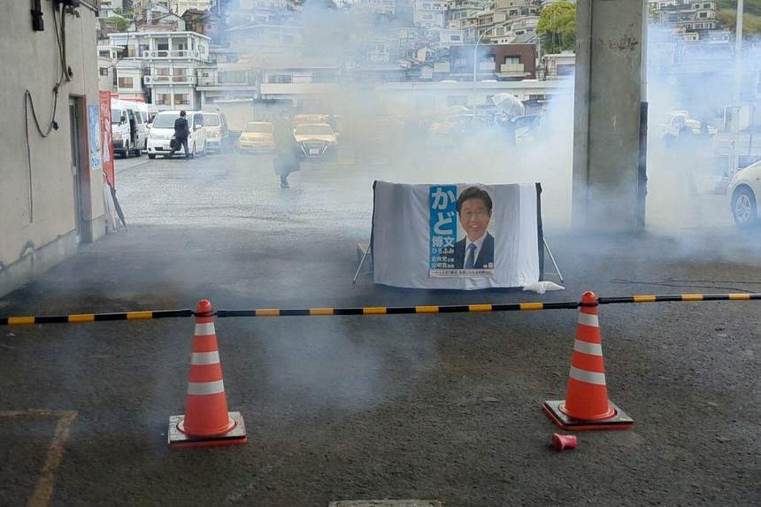 Japan PM Kishida Unhurt After Smoke Bomb Thrown At Him During Outdoor ...