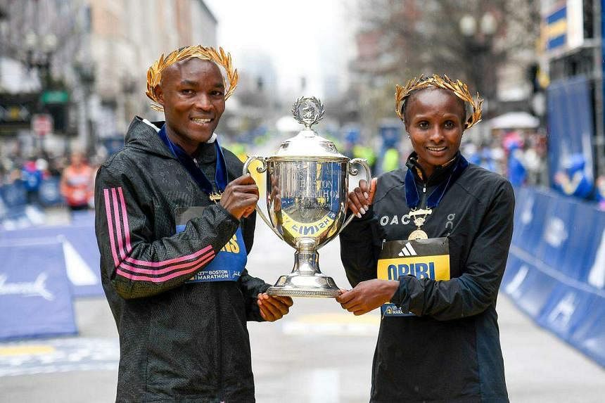 Cheruiyot stands tall to defend Boston Marathon title