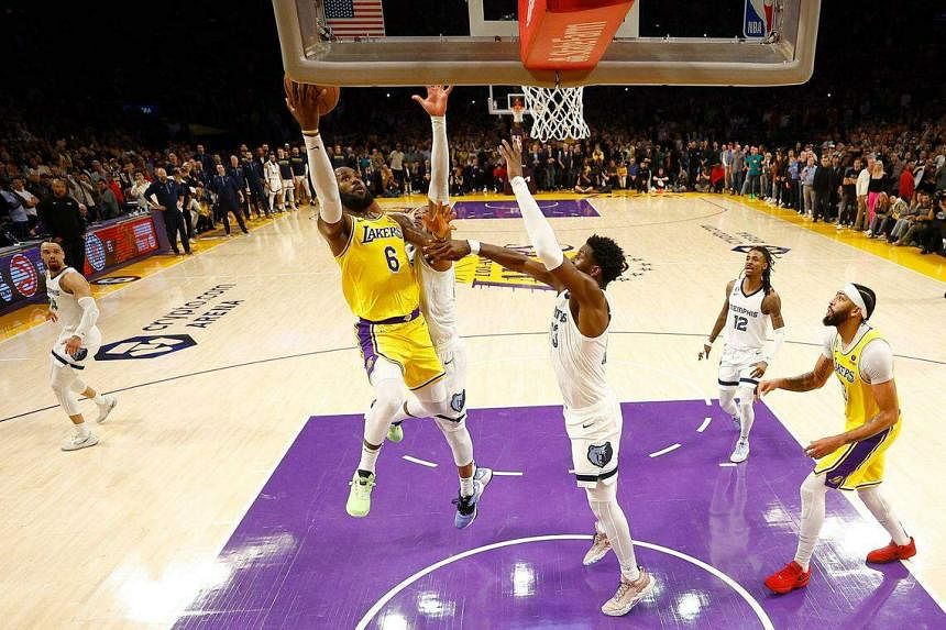 James, Lakers hold off Memphis in overtime