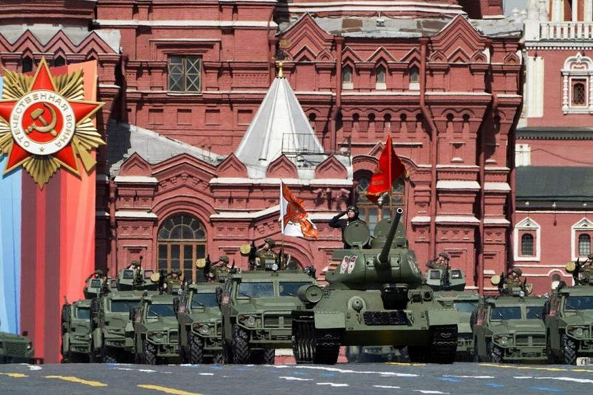 Russia’s Putin, at Red Square parade, calls for victory in Ukraine