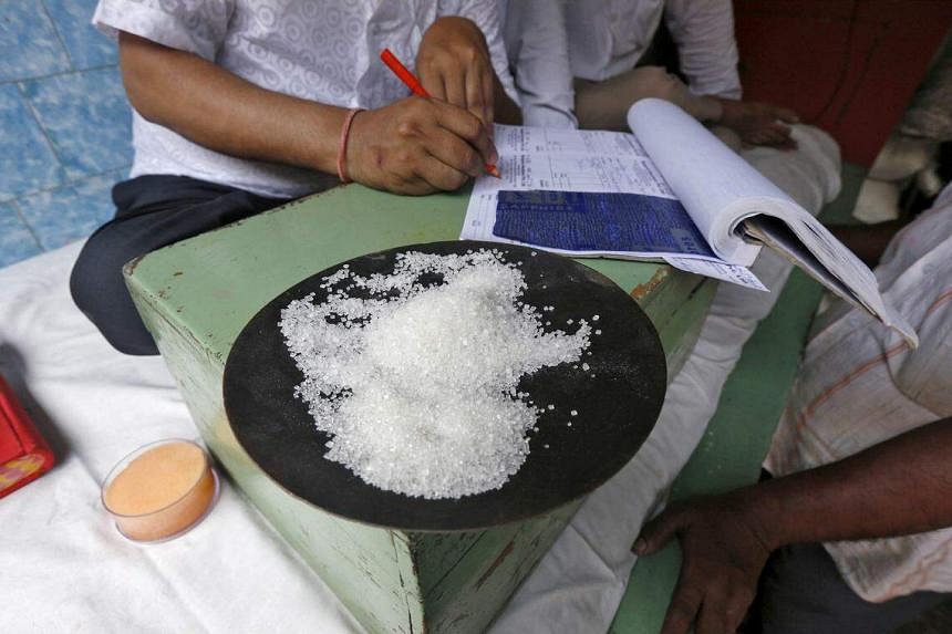 India extends curbs on sugar exports to calm domestic prices