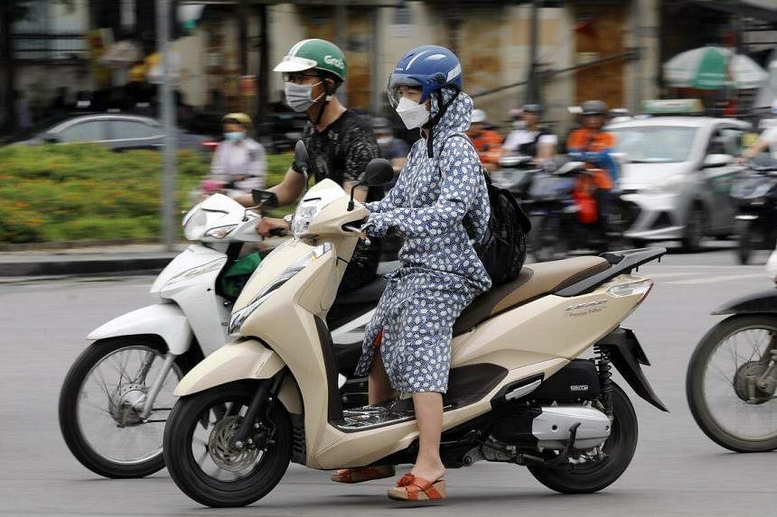 ‘Wear less-stuffy clothing’: Vietnam’s biggest city tries to save power ...