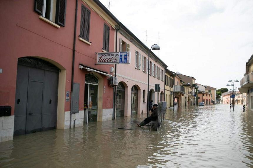 Italy flood deaths rise to 14 as thousands wait to get home The