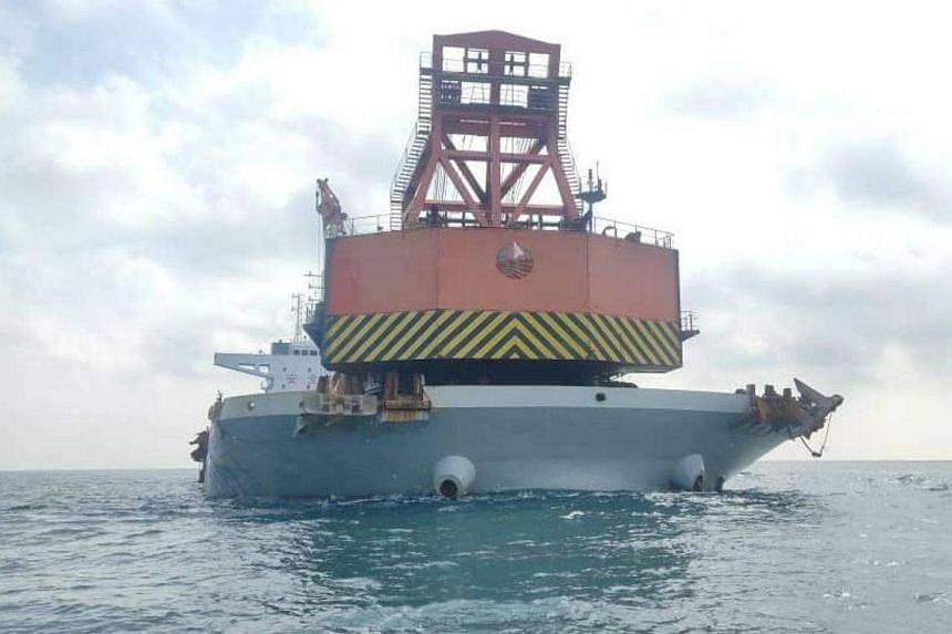 马来西亚扣押涉嫌非法打捞英国二战残骸的中国船只