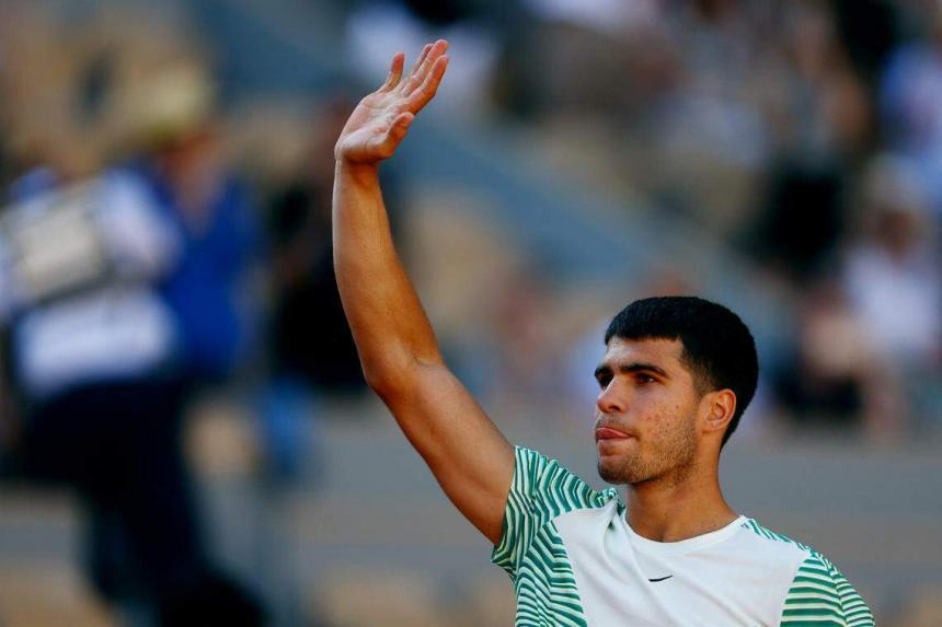Carlos Alcaraz overcomes wobble to reach French Open last 32 | The
