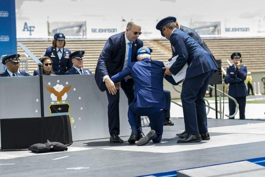 Biden trips and falls during air force graduation ceremony, recovers  quickly | The Straits Times