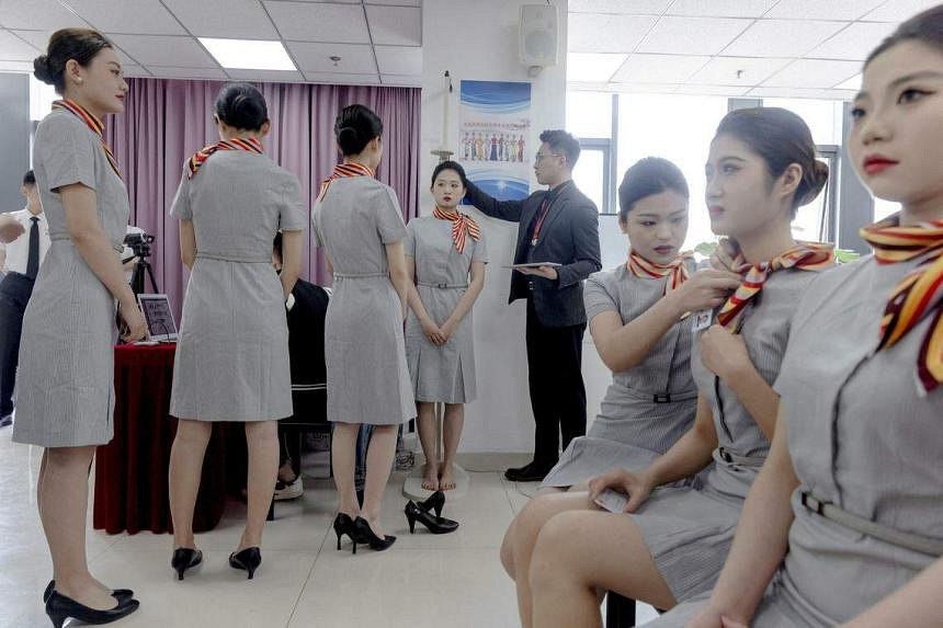 Rule on grounding ‘overweight’ female Hainan Airlines attendants sparks public outcry in China