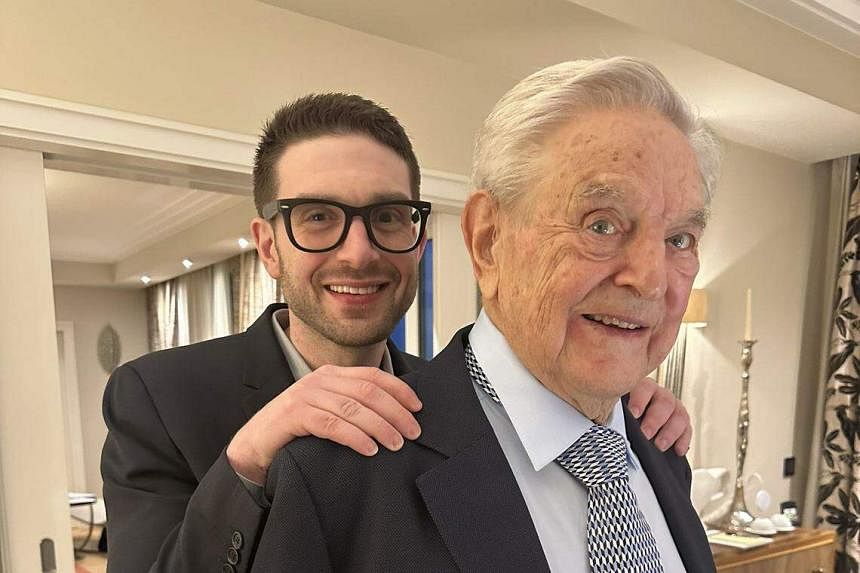 Billionaire George Soros hands control of empire to son Alex | The Straits Times