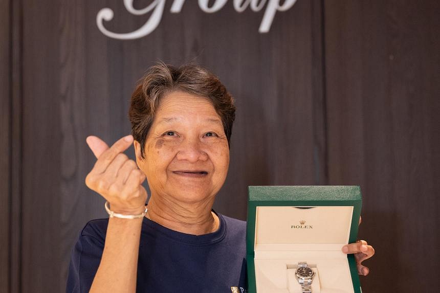 Cleaner receives Rolex watch for working 10 years in Paradise