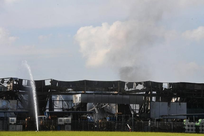 Huge fire in Tuas industrial building causes $10m in losses; MRT ...
