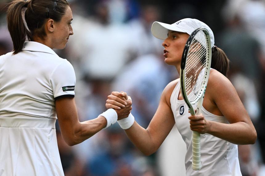 Iga Swiatek remains on course at Wimbledon after beating Petra Martic