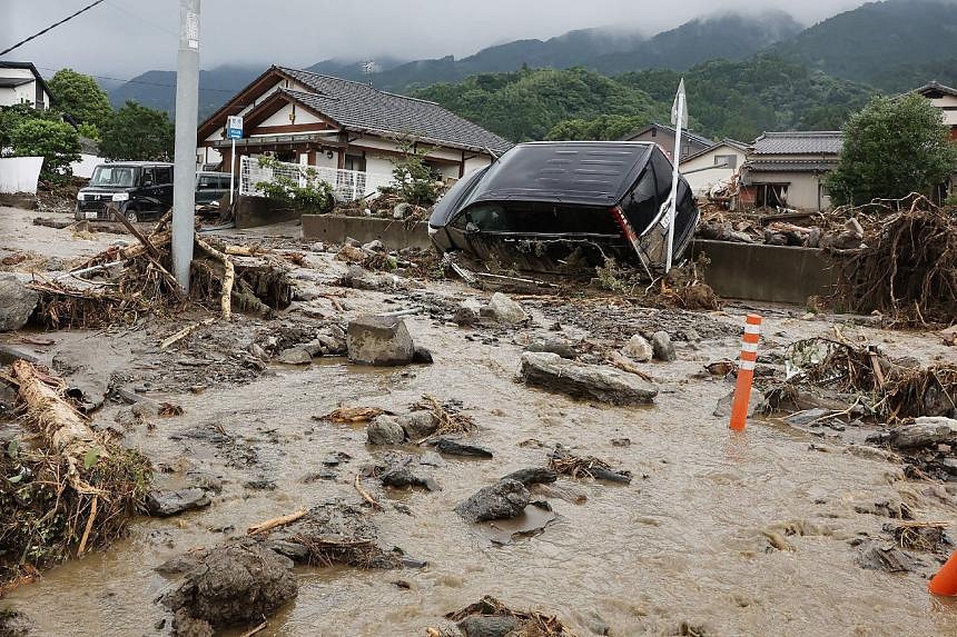 Heavy rain in southern Japan leaves up to six people dead, three ...