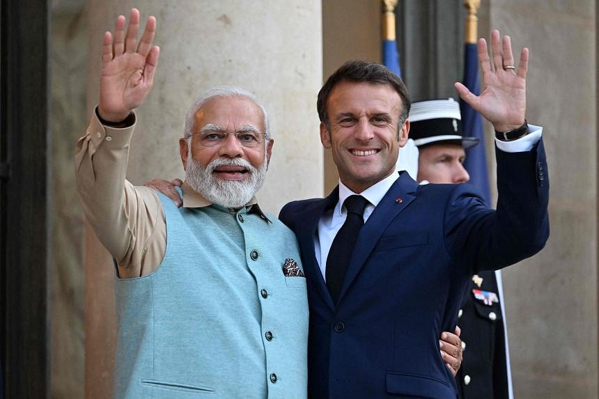 Macron awards Modi top honour as France marks Bastille Day amid fears ...