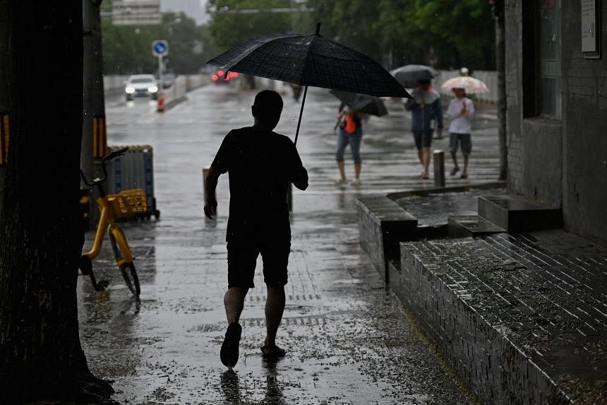 Typhoon Doksuri leaves 2 dead in Beijing as city issues red alert