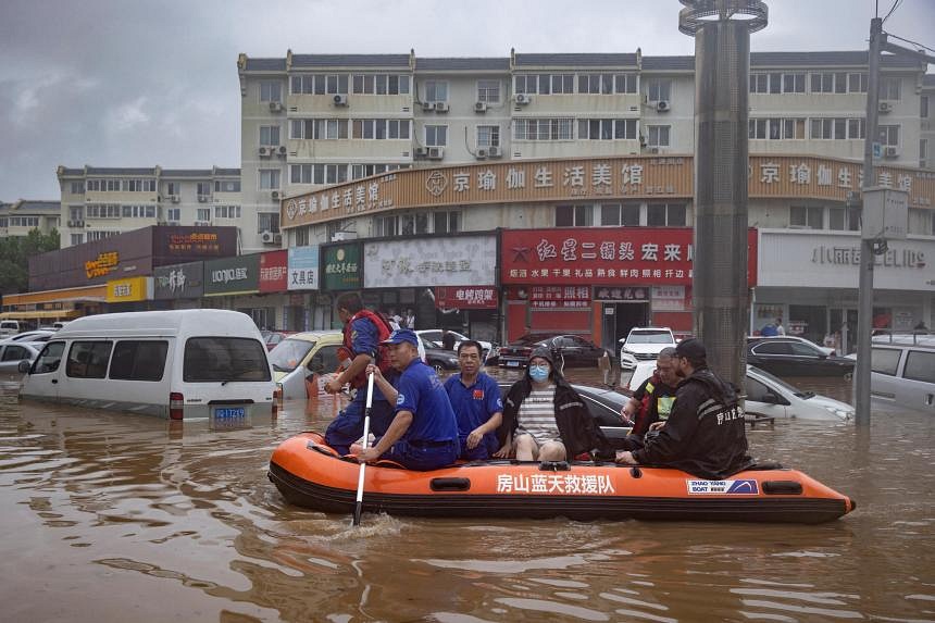 Incessant Rain From Typhoon Doksuri Leaves 20 Dead, 19 Missing In China ...