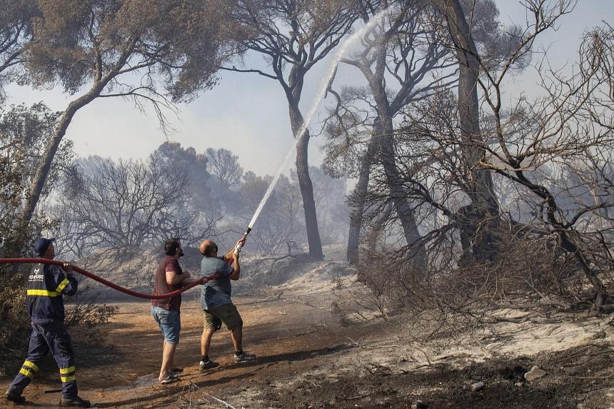 Heatwave returns to Spain as destructive storm batters Nordic region ...