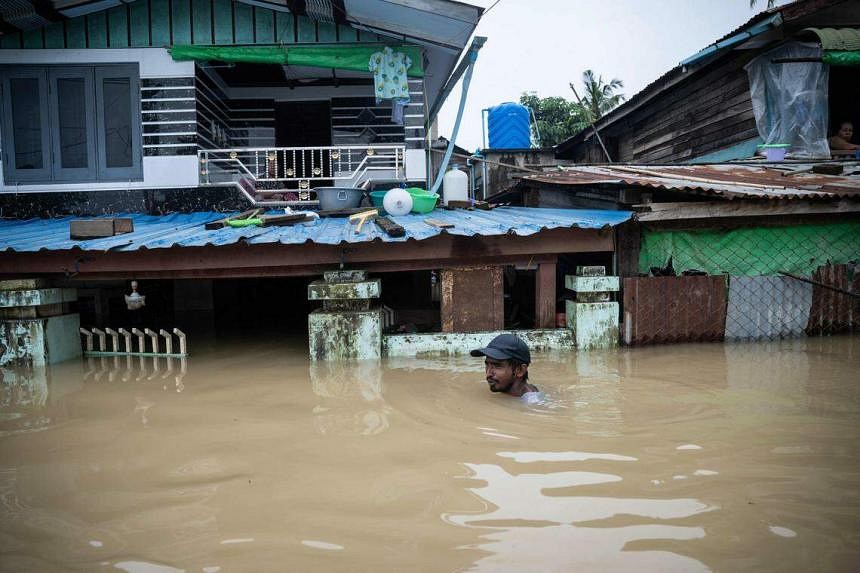 48,000 evacuated from flood-hit homes in Myanmar, waiting to go home ...