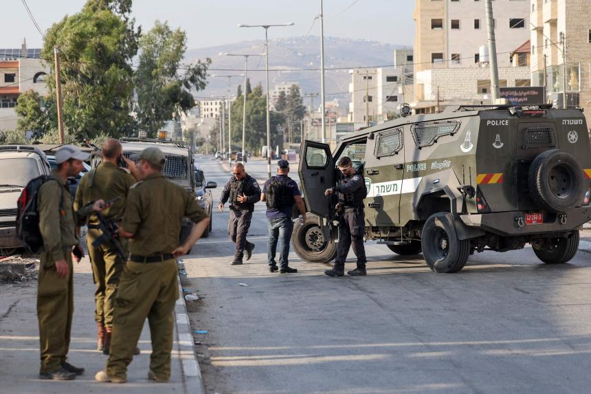 Israeli father, son shot dead at a car wash in West Bank violence