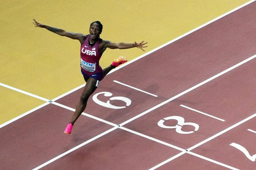 American Richardson claims world gold in women's 100m