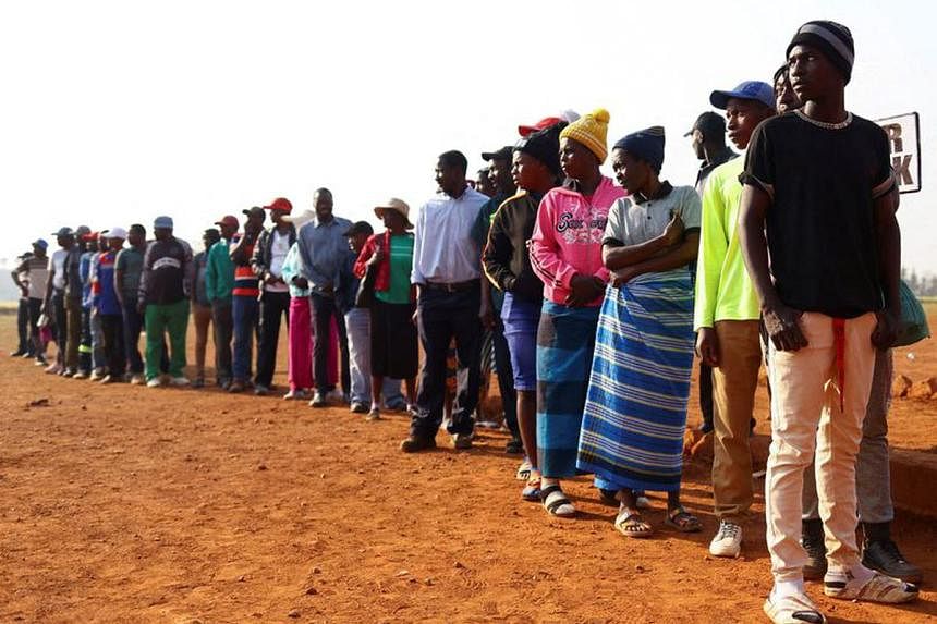 Zimbabweans vote for second day in wards hit by delays The Straits Times