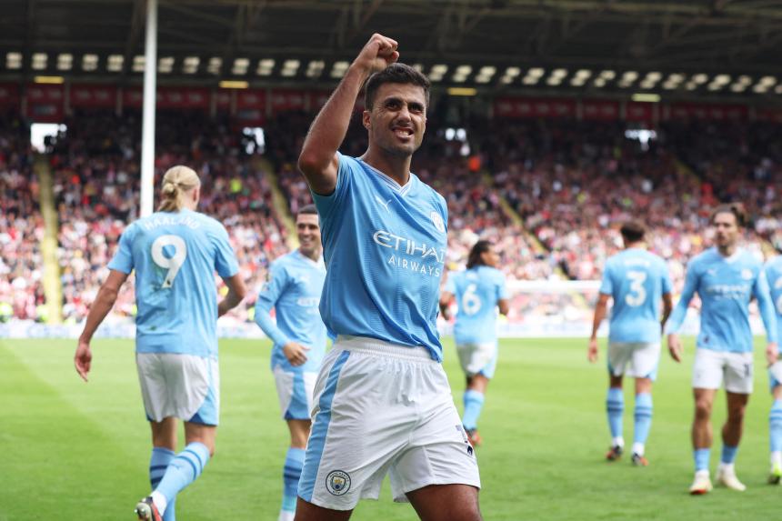 Rodri strikes late as Manchester City extend perfect start in English ...