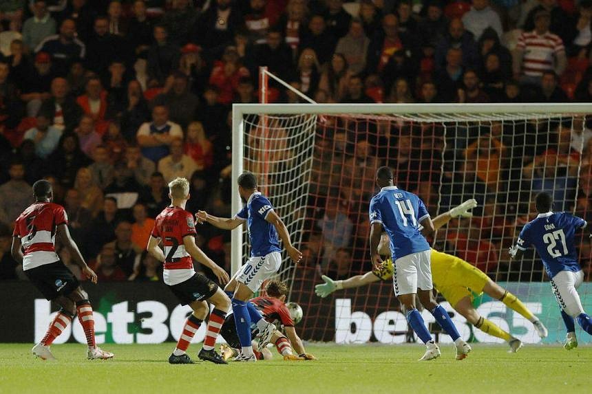 Chelsea fight back to beat Wimbledon 2-1 in League Cup, Everton through