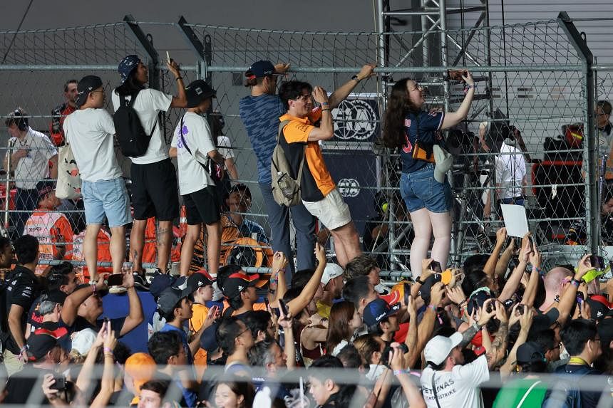 Crazy Fan Walks Onto Track During Singapore Grand Prix