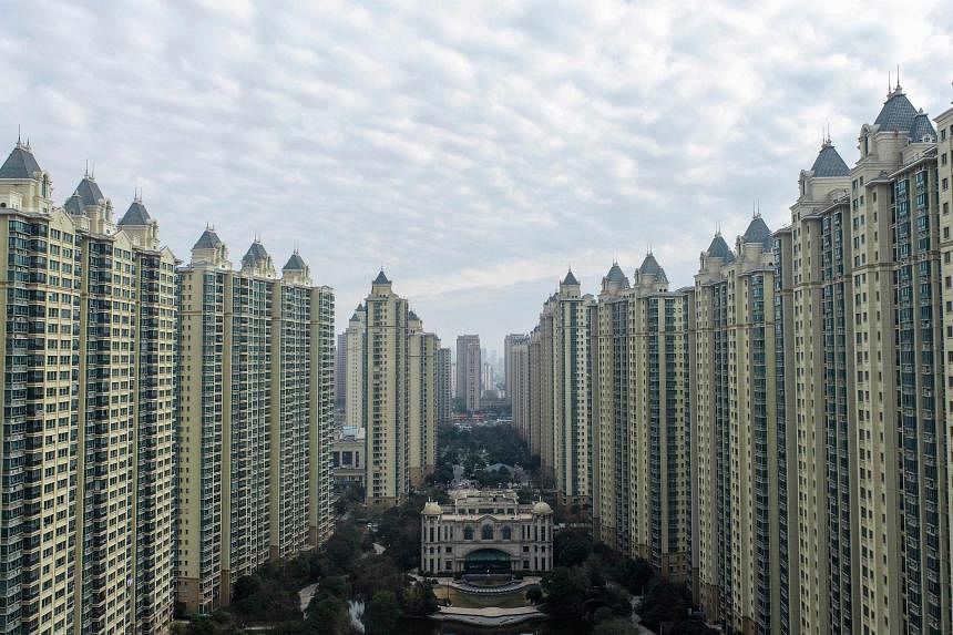 Even China's 1.4 billion population can't fill all its vacant homes, says  former official | The Straits Times