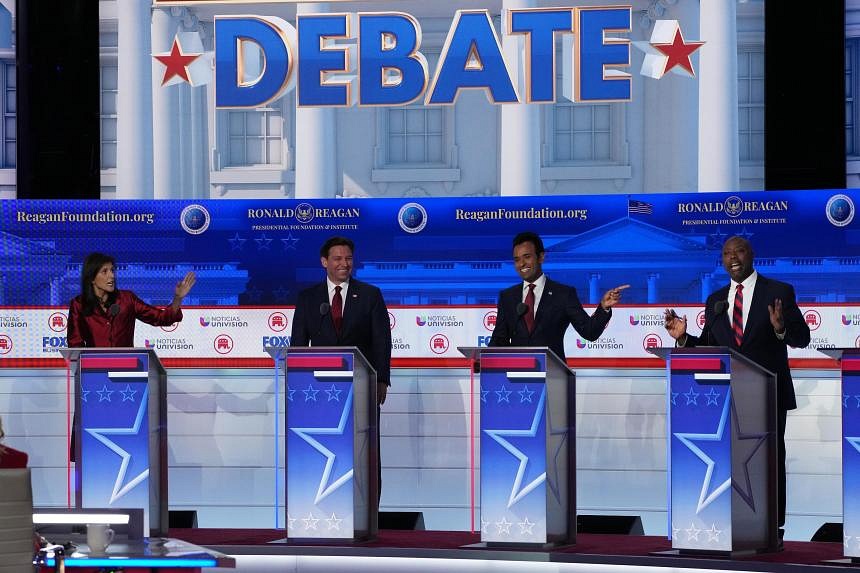 With Trump again absent, Republicans trade barbs at messy debate | The ...