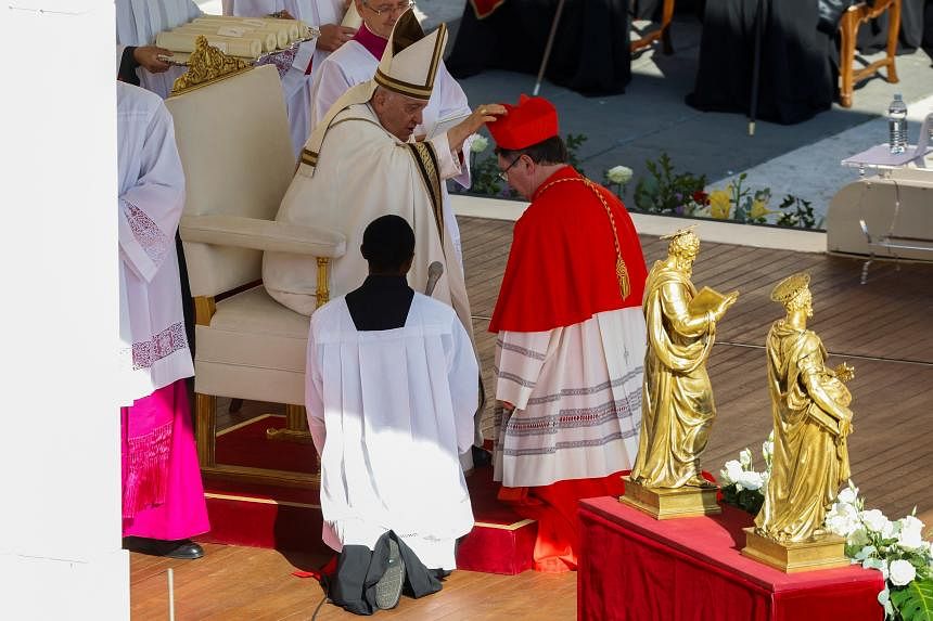 Pope gives prestigious red hats to 5 new cardinals