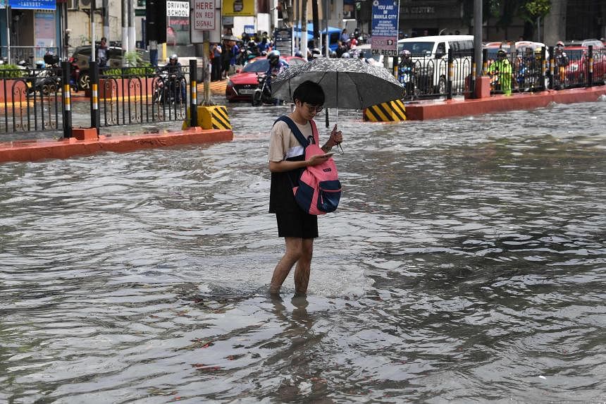 Philippines braces for flash floods as Typhoon Koinu hovers