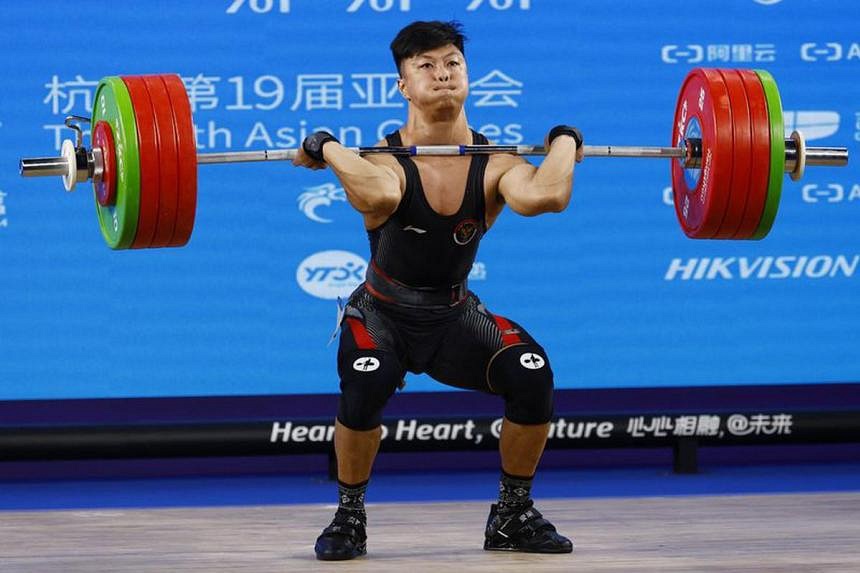 China's Divers Delight, Abdullah Sets Weightlifting World Record At ...