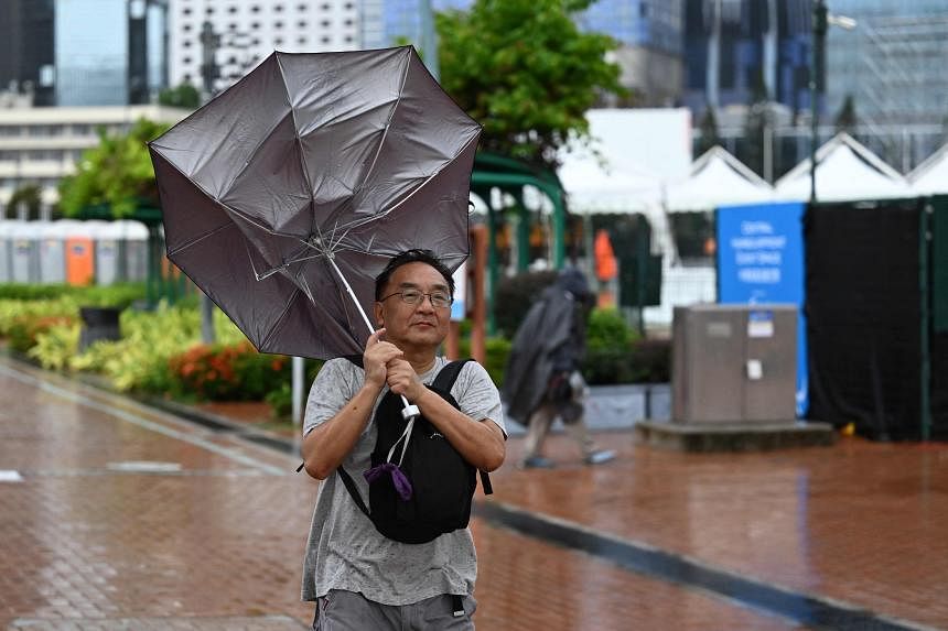 Remnants of Typhoon Koinu bring floods to Hong Kong | The Straits Times