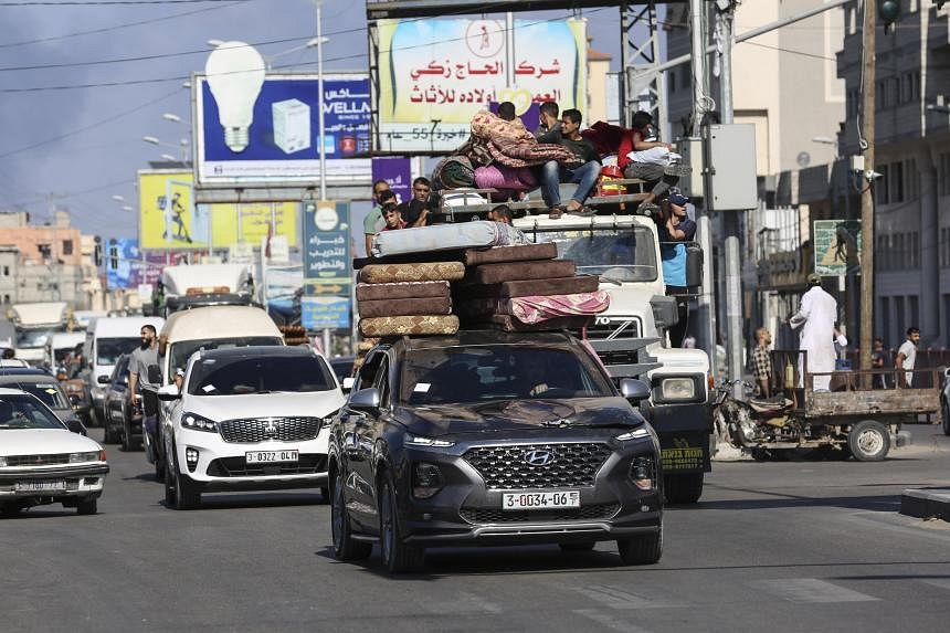 Thousands Flee Gaza After Israel Orders Mass Evacuation | The Straits Times