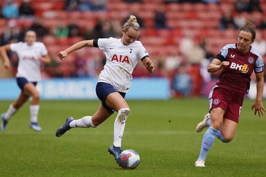 Football: Soccer-Thomas hat-trick sends Spurs top of WSL after 4-2 win over Aston  Villa