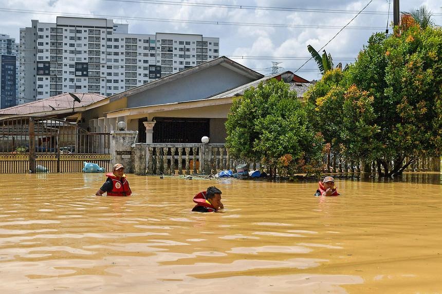 Heavy Rain Causes Floods In Some Parts Of Malaysia The Straits Times   FW1338520SG0805112023BANJIR 