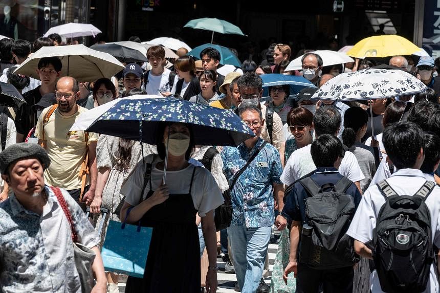 Cities near Tokyo mark 'summer' weather with record high