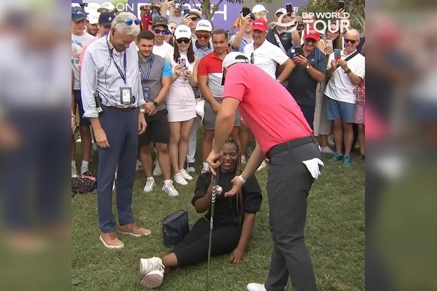 McIlroy tee shot lands on spectator's lap in Dubai