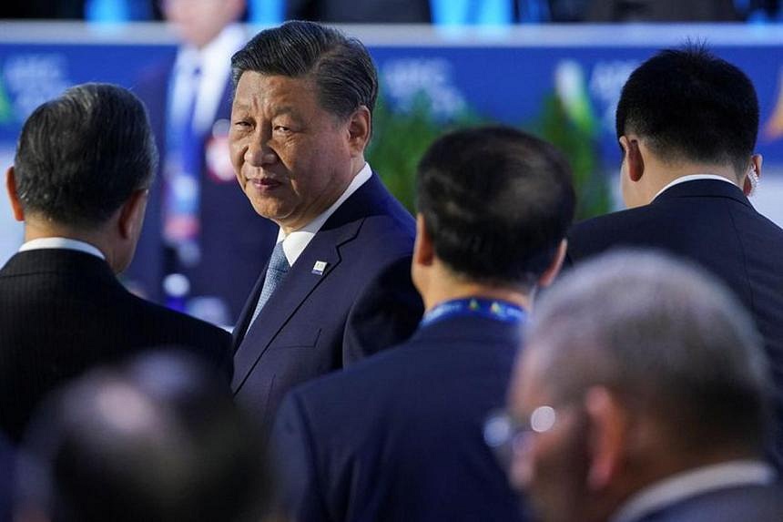 China's Xi visits financial hub Shanghai in first trip in three years ...