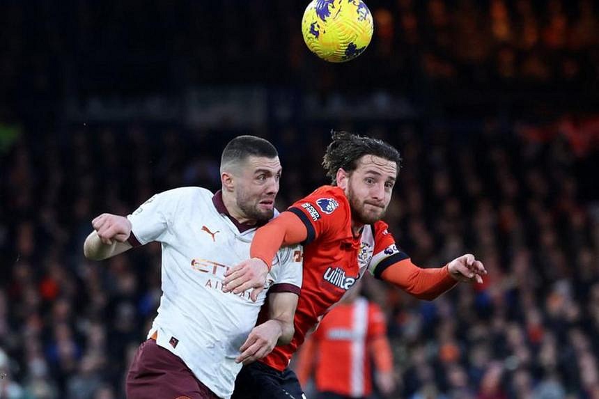 Man City return to winning ways with 2-1 victory over Luton | The Straits  Times