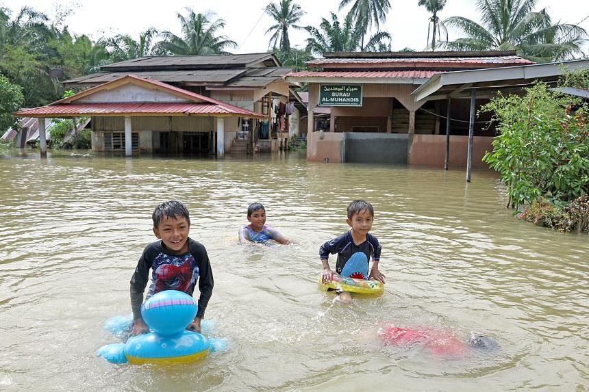 In Pictures: Malaysia Floods Force Over 27,000 To Evacuate | The ...