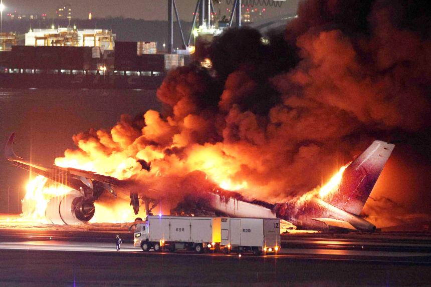 How Japan Airlines crew led 367 passengers to safety from a burning plane