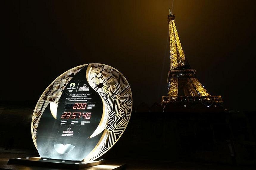 Macron Hits Paris 2024 Countdown Button | The Straits Times