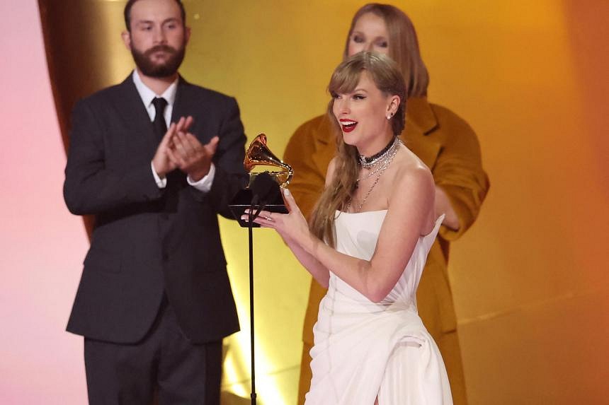 Grammys Taylor Swift wins Album of the Year Grammy, breaking record