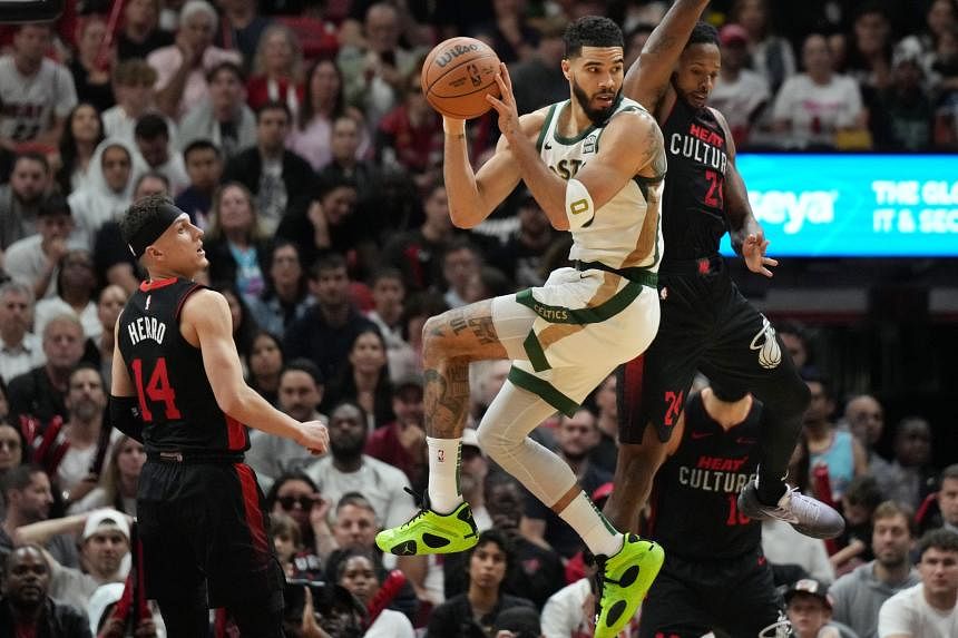 Boston Celtics hold off Miami Heat in bruising NBA clash | The Straits Times